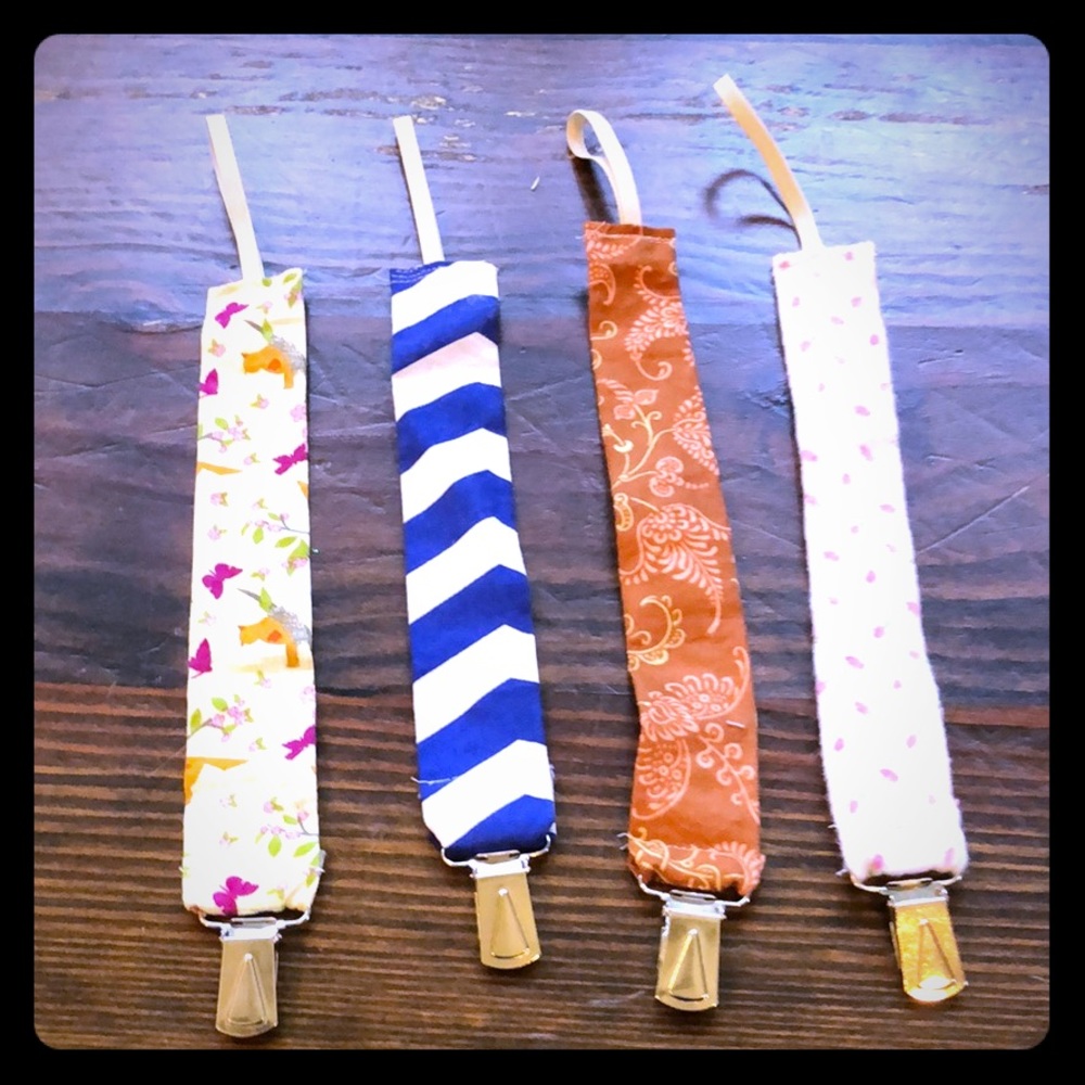 4 pacifier holders